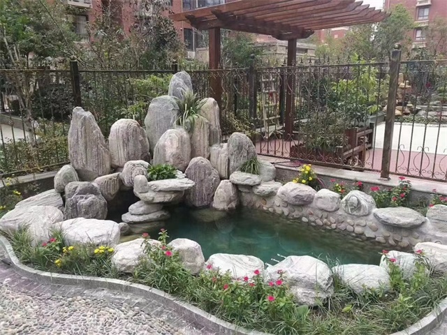 济南庭院假山鱼池制作视频