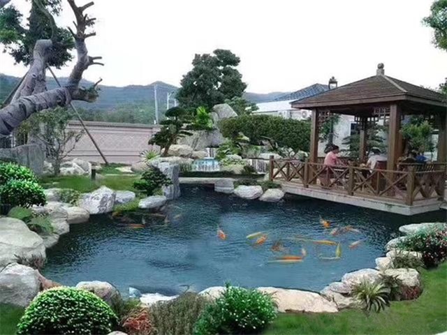 济南庭院鱼池假山设计